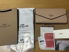 コーチ 長財布 フラップ開閉式 アプリコット CU158