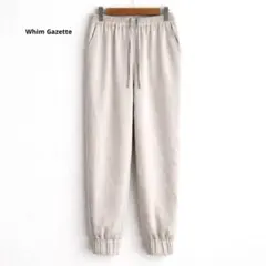 定価1.98万 ウィムガゼット JOGパンツ エクリュ 春パンツ ツヤ素材のサムネイル