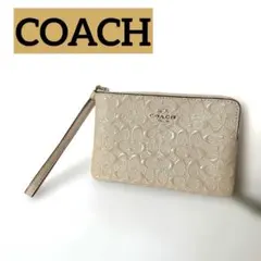 COACH リストレット ポーチ ラメ エナメル ベージュ