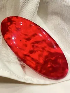 赤い楕円形バレッタ