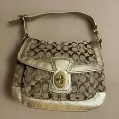 コーチ レガシーシグネチャーターンロック y2kショルダー　ゴールド/ベージュ