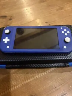 Nintendo Switch Lite 青色 + ソフト2本付き - メルカリ