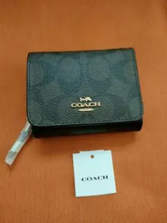 [新品未使用】COACH（コーチ）折りたたみ財布／コインケース付き