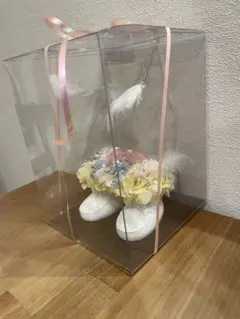 아기 신발 모양의 프리저브드 플라워