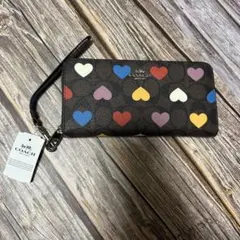 コーチ シグネチャ ハートプリント ジップアラウンド長財布CP411