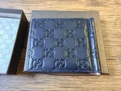 GUCCI 二つ折り財布　マネークリップ　シマ　ブラック 170580