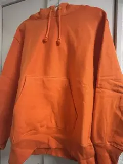 オレンジ フード付きパーカー