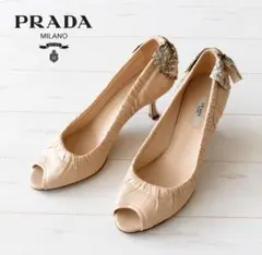 ​【美品】PRADA プラダ オープントゥパンプス リボン ベージュ 36.5のサムネイル