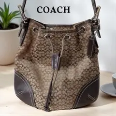 【定番人気】COACH コーチ 巾着型 ショルダーバッグ シグネチャー柄