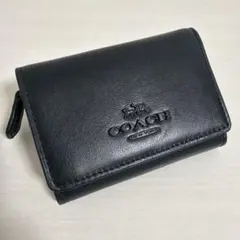 coach コーチ　三つ折り　ミニ財布　ブラック　レザー　馬車ロゴ　コンパクトのサムネイル