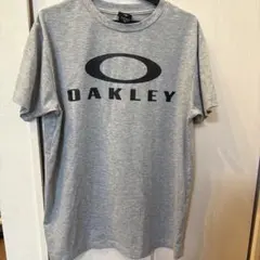 OAKLEY グレー ロゴTシャツ