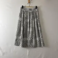 ヒューマンウーマン 総柄パッチワークプリントスカート 膝下丈 コットン ブラック