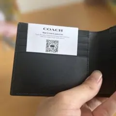 新品・未使用】COACH ブラック 二つ折り財布 型番:CJ883 - メルカリ