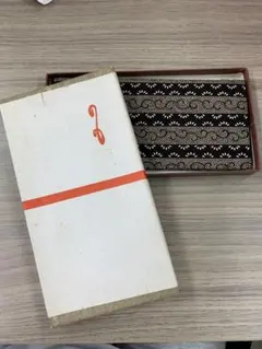 美品】印傳屋 甲州印伝 長財布 爪唐草 黒地×白漆 伝統工芸品 - メルカリ