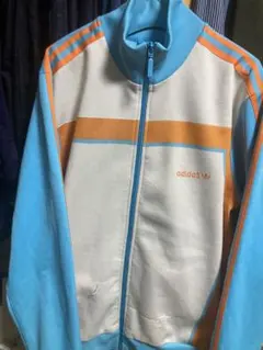 希少カラー adidas トラックジャケット 水色×オレンジ 90s 万国旗タグのサムネイル