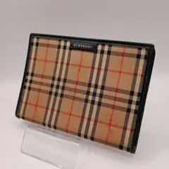 BURBERRY エンボスロゴ インナーノバチェック レザーポーチ ブラック 