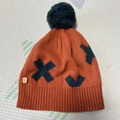 tiny cottons オレンジ ポンポン付き ニット帽 Xマーク　タイニー