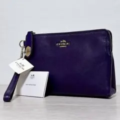 【未使用】Coach コーチ ターンロック レザー リストレットポーチ パープルのサムネイル