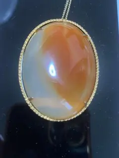 オーバル型オレンジクリームブローチ(天然石)約4センチ