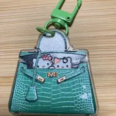 猫キャラクターの緑色ハンドバッグキーホルダー