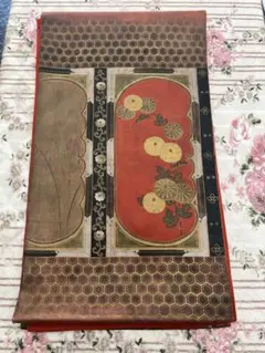 袋帯 菊文様 織り出し 赤茶系 美品のサムネイル