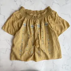 シュープリームララ エスニック刺繍ブラウス　【M】　マスタード　タッセル紐 半袖のサムネイル