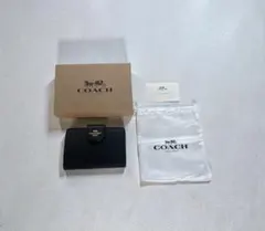 新品 COACH コーチ 二つ折り財布 ブラック キルティング CM241 - メルカリ