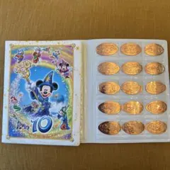 ディズニーリゾートのスーベニアメダル45枚とコレクションブック 2011年