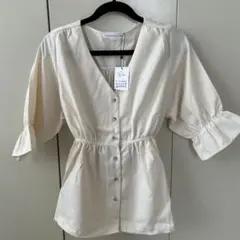 ペプラムトップス