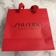 SHISEIDO 赤色ショッピングバッグのサムネイル