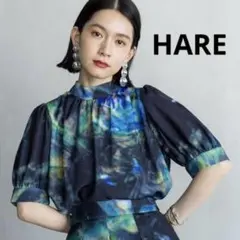 完売品 HARE ハレ BLURボウタイブラウス ブルーグリーン 半袖 アート柄のサムネイル