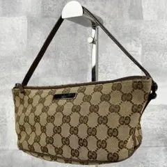 美品 グッチ キャンバス アクセサリーポーチ GG柄 ロゴ型押し ファスナー 茶