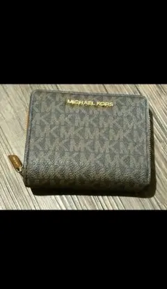 MICHAEL KORS モノグラム二つ折り財布 ダークブラウン シグネチャー柄