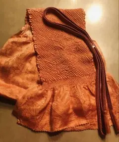 オレンジ色の刺繍入り帯締め