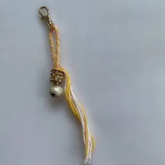 鈴付きイエローとホワイトストチャーム