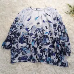 美品 オースチンリード 総柄シフォンブラウス 40 L ブルー 首元装飾 洗えるのサムネイル