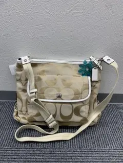 COACH デイジーシグネチャー ファイルバッグ ベージュ ファスナー開閉 