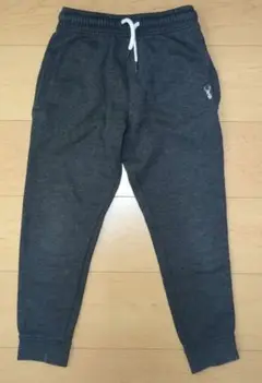 next ダークグレー 長ズボン 鹿の刺繍付き