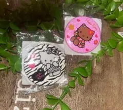 ハローキティ缶バッジ　日焼けキティ　キティちゃん缶バッチ　ゼブラ　ピンク