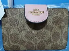 新品・未使用COACH 二つ折り財布 シグネチャー ピンクのサムネイル
