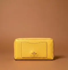 COACH ラウンドファスナー長財布 イエローのサムネイル