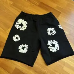 DENIM TEARS ブラック花柄ショートパンツ