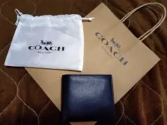 【新品未使用】COACHメンズ二つ折り財布ブラック本革ロゴ型押し コインケース無