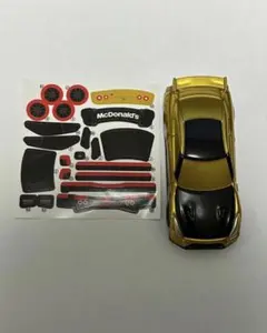 トミカ ハッピーセット ひみつのおもちゃ 日産GTR ゴールドのサムネイル