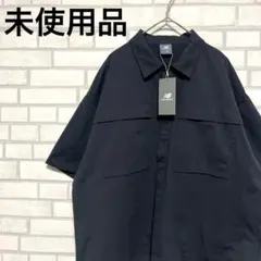 未使用品　ニューバランス　黒シャツ　半袖　ロゴ入りのサムネイル