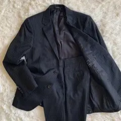 【新品】MEN’S BIGI メンズビギ ブラックスーツ ストライプ ウールのサムネイル
