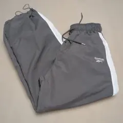 新品Reebok ナイロンパンツジョガーパンツ М