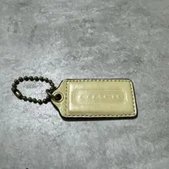 COACH ロゴチャーム タグ ㊷ ベージュ