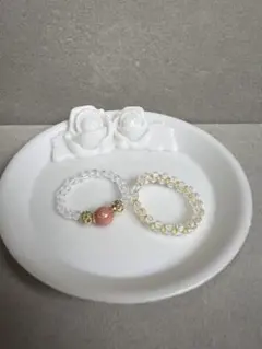 クリスタルとピンクの石のリングセット