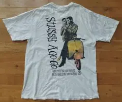 【STUSSY】ローマの休日サンプリング　ロンT 長袖　マスタード STUSSY】ローマの休日サンプリング ロンT 長袖 マスタード